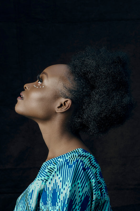 woman in blue and white shirt